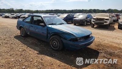 Zdjęcie 13 z 14 samochodu: 1994 PONTIAC SUNBIRD LE VIN:1G2JB14T4R7546107 - miniatura