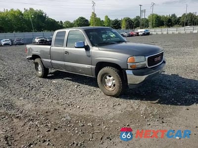 Zdjęcie 13 z 14 samochodu: 1999 GMC NEW SIERRA K1500 VIN:1GTEK19T8XZ535635 - miniatura