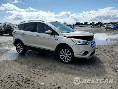 Zdjęcie 14 z 16 samochodu: 2017 FORD ESCAPE TITANIUM VIN:1FMCU9JDXHUC17109 - miniatura