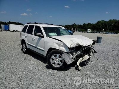 Zdjęcie 15 z 16 samochodu: 2009 JEEP GRAND CHEROKEE LAREDO VIN:1J8GR48K49C520756 - miniatura