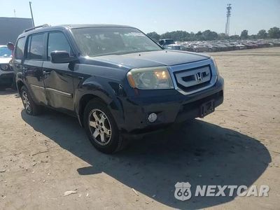 Zdjęcie 14 z 15 samochodu: 2011 HONDA PILOT TOURING VIN:5FNYF4H93BB002941 - miniatura