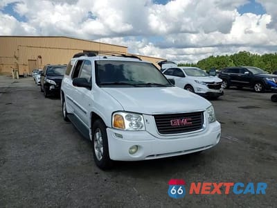 Zdjęcie 13 z 14 samochodu: 2004 GMC ENVOY XL VIN:1GKET16P846118571 - miniatura