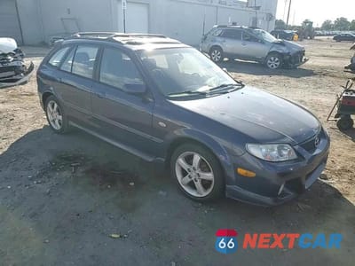 Zdjęcie 13 z 14 samochodu: 2002 MAZDA PROTEGE PR5 VIN:JM1BJ246221612181 - miniatura