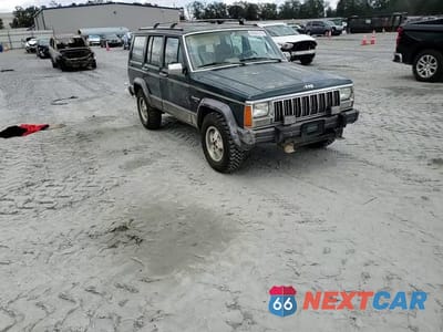 Zdjęcie 13 z 14 samochodu: 1992 JEEP CHEROKEE LAREDO VIN:1J4FJ58S5NL200771 - miniatura