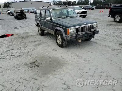 Zdjęcie 13 z 14 samochodu: 1992 JEEP CHEROKEE LAREDO VIN:1J4FJ58S5NL200771 - miniatura