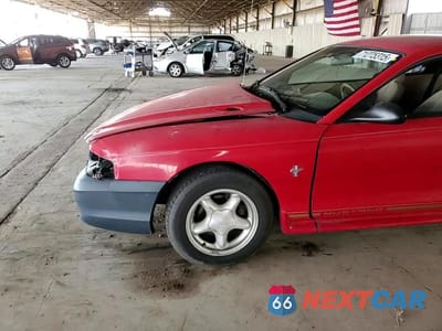 Zdjęcie 14 z 15 samochodu: 1998 FORD MUSTANG VIN:1FAFP4045WF247641 - miniatura