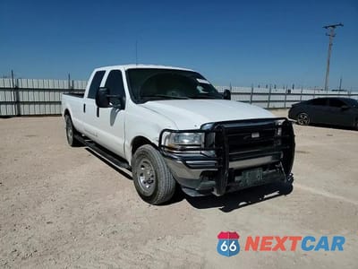 Zdjęcie 13 z 14 samochodu: 2002 FORD F350 SRW SUPER DUTY VIN:3FTSW30F12MA00263 - miniatura