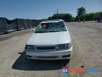 Zdjęcie 13 z 13 samochodu: 1996 INFINITI G20 VIN:JNKCP01D0TT544056 - miniatura