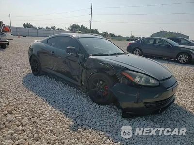 Zdjęcie 13 z 14 samochodu: 2007 HYUNDAI TIBURON GS VIN:KMHHM66D27U236264 - miniatura