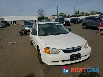 Zdjęcie 13 z 14 samochodu: 2000 MAZDA PROTEGE DX VIN:JM1BJ222XY0308482 - miniatura