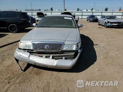 Zdjęcie 14 z 15 samochodu: 2003 MERCURY GRAND MARQUIS GS VIN:2MEFM74W93X625944 - miniatura