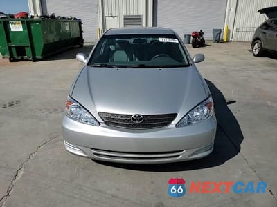 Zdjęcie 13 z 14 samochodu: 2004 TOYOTA CAMRY LE VIN:4T1BF32K84U569518 - miniatura