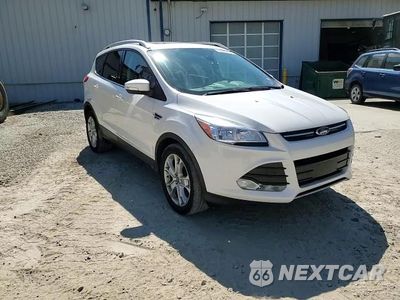 Zdjęcie 14 z 15 samochodu: 2016 FORD ESCAPE TITANIUM VIN:1FMCU9J97GUB18189 - miniatura