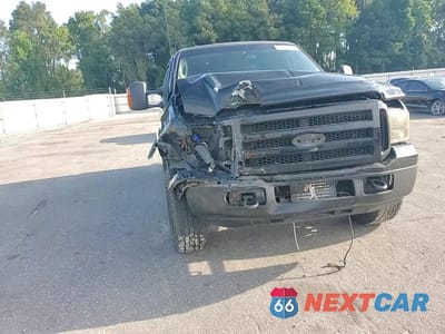 Zdjęcie 13 z 14 samochodu: 2005 FORD EXCURSION LIMITED VIN:1FMSU43P95ED02843 - miniatura