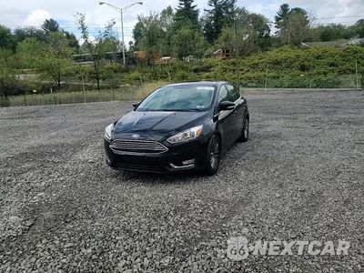Zdjęcie 13 z 15 samochodu: 2018 FORD FOCUS TITANIUM VIN:1FADP3N29JL314079 - miniatura