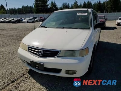 Zdjęcie 14 z 15 samochodu: 2002 HONDA ODYSSEY EX VIN:2HKRL18672H536236 - miniatura