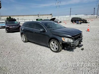 Zdjęcie 14 z 15 samochodu: 2015 VOLVO V60 PREMIER+ VIN:YV140MEC2F1203836 - miniatura