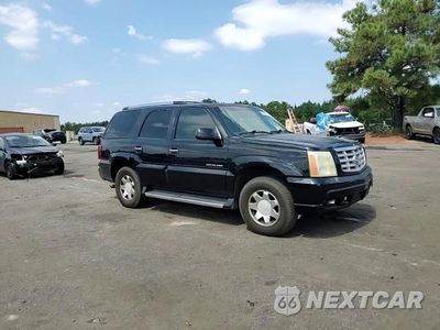 Zdjęcie 14 z 15 samochodu: 2003 CADILLAC ESCALADE VIN:1GYEC63T23R240599 - miniatura