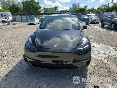 Zdjęcie 14 z 15 samochodu: 2023 TESLA MODEL Y VIN:7SAYGDEF0PF660573 - miniatura