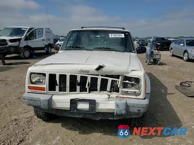 Zdjęcie 14 z 15 samochodu: 2001 JEEP CHEROKEE SPORT VIN:1J4FF48S81L631689 - miniatura
