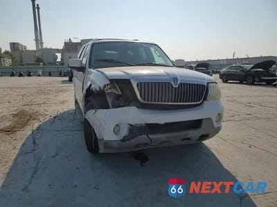 Zdjęcie 14 z 15 samochodu: 2004 LINCOLN NAVIGATOR VIN:5LMFU27R54LJ26348 - miniatura