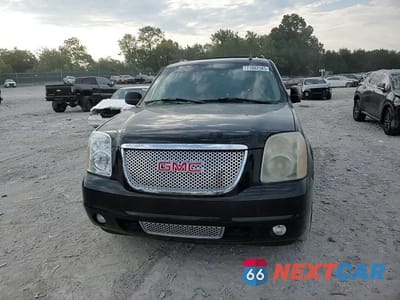 Zdjęcie 14 z 15 samochodu: 2007 GMC YUKON XL DENALI VIN:1GKFK66817J325074 - miniatura