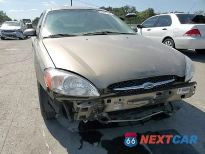 Zdjęcie 14 z 15 samochodu: 2003 FORD TAURUS SES VIN:1FAFP552X3A152451 - miniatura