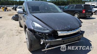 Zdjęcie 14 z 15 samochodu: 2023 TESLA MODEL Y VIN:7SAYGDEE7PF926341 - miniatura