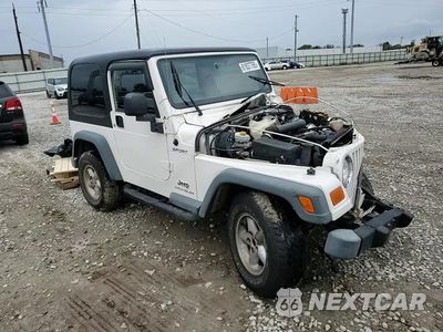 Zdjęcie 13 z 14 samochodu: 2006 JEEP WRANGLER / TJ SPORT VIN:1J4F449S76P733554 - miniatura