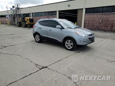 Zdjęcie 14 z 15 samochodu: 2011 HYUNDAI TUCSON GLS VIN:KM8JU3AC5BU174947 - miniatura
