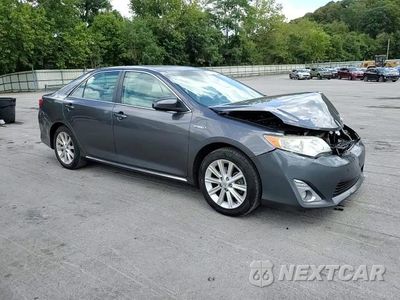 Zdjęcie 13 z 14 samochodu: 2013 TOYOTA CAMRY HYBRID VIN:4T1BD1FK0DU080437 - miniatura