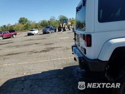 Zdjęcie 14 z 15 samochodu: 2013 JEEP WRANGLER UNLIMITED SAHARA VIN:1C4BJWEG4DL537747 - miniatura