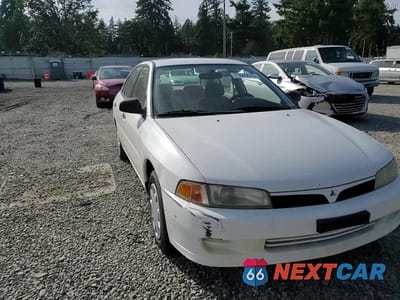 Zdjęcie 13 z 14 samochodu: 2001 MITSUBISHI MIRAGE ES VIN:JA3AY26C41U052816 - miniatura