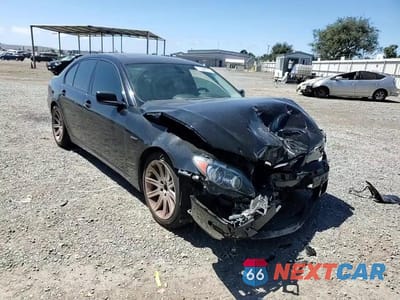 Zdjęcie 13 z 14 samochodu: 2006 BMW 750 I VIN:WBAHL83506DT07215 - miniatura