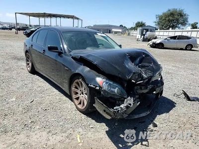 Zdjęcie 13 z 14 samochodu: 2006 BMW 750 I VIN:WBAHL83506DT07215 - miniatura