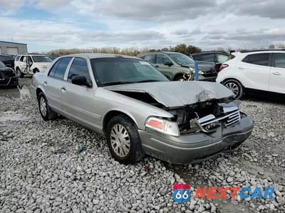 Zdjęcie 10 z 15 samochodu: 2003 FORD CROWN VICTORIA LX VIN:2FAFP74W33X220077 - miniatura