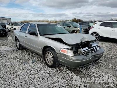 Zdjęcie 10 z 15 samochodu: 2003 FORD CROWN VICTORIA LX VIN:2FAFP74W33X220077 - miniatura