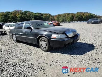 Zdjęcie 10 z 13 samochodu: 2003 LINCOLN TOWN CAR SIGNATURE VIN:1LNHM82W13Y703695 - miniatura
