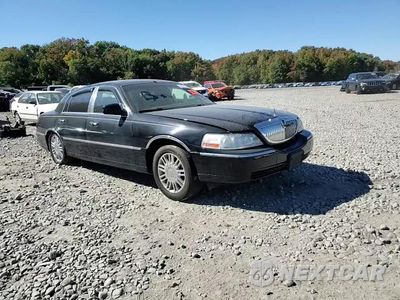Zdjęcie 10 z 13 samochodu: 2003 LINCOLN TOWN CAR SIGNATURE VIN:1LNHM82W13Y703695 - miniatura
