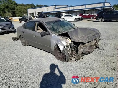 Zdjęcie 10 z 14 samochodu: 2003 NISSAN ALTIMA BASE VIN:1N4AL11D83C287650 - miniatura