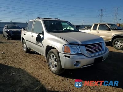 Zdjęcie 11 z 14 samochodu: 2009 GMC ENVOY SLE VIN:1GKDT33S892102580 - miniatura