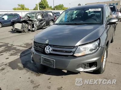 Zdjęcie 14 z 15 samochodu: 2014 VOLKSWAGEN TIGUAN S VIN:WVGBV3AXXEW518818 - miniatura