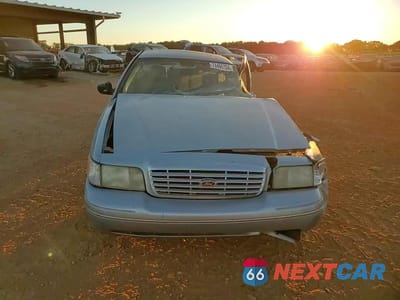 Zdjęcie 11 z 13 samochodu: 2004 FORD CROWN VICTORIA LX VIN:2FAHP74W84X151316 - miniatura