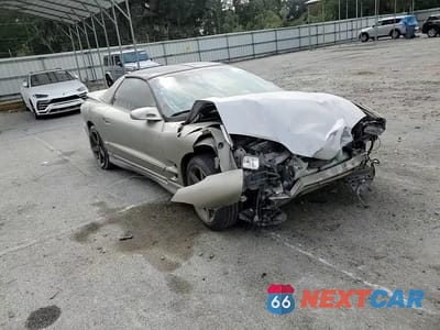 Zdjęcie 10 z 14 samochodu: 1999 PONTIAC FIREBIRD VIN:2G2FS22KXX2235243 - miniatura