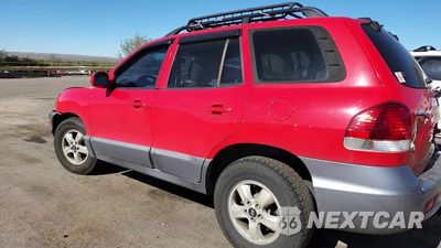 Zdjęcie 14 z 15 samochodu: 2005 HYUNDAI SANTA FE GLS VIN:KM8SC73D85U882909 - miniatura