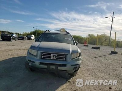 Zdjęcie 13 z 14 samochodu: 2006 HONDA RIDGELINE RTL VIN:2HJYK16536H563937 - miniatura