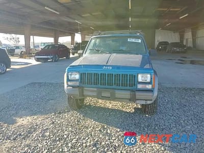 Zdjęcie 13 z 14 samochodu: 1994 JEEP CHEROKEE COUNTRY VIN:1J4FT78S2RL102874 - miniatura