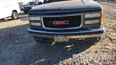 Zdjęcie 14 z 15 samochodu: 1999 GMC YUKON VIN:1GKEK13RXXJ812057 - miniatura