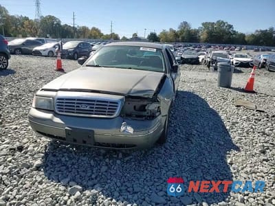 Zdjęcie 13 z 14 samochodu: 2004 FORD CROWN VICTORIA LX VIN:2FAFP74W84X150562 - miniatura