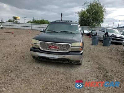 Zdjęcie 14 z 15 samochodu: 2004 GMC YUKON VIN:1GKEC13Z74R157320 - miniatura